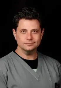 דר אולג זקס מומחה לשיקום פה